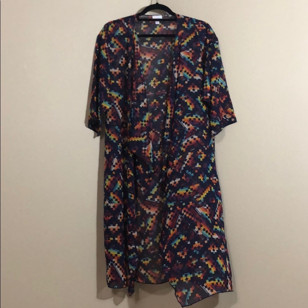 Purple with rainbow geo print M Lularoe Shirley